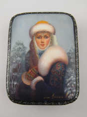 Appraisal: A Russian lacquer box the hinged ld with a girl