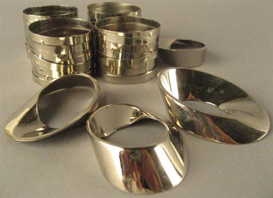 Appraisal: Stainless Steel Napkin Rings Two sets of four each Unsigned