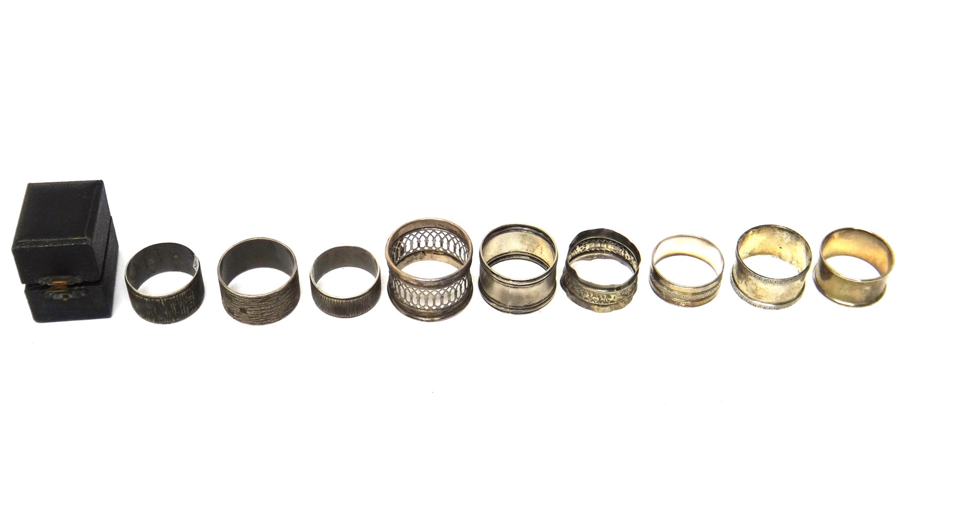 Appraisal: Six silver napkin rings a Sterling napkin ring combined weight