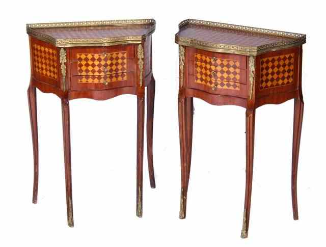 Appraisal: A PAIR OF FRENCH PARQUETRY SIDE TABLES of shaped form