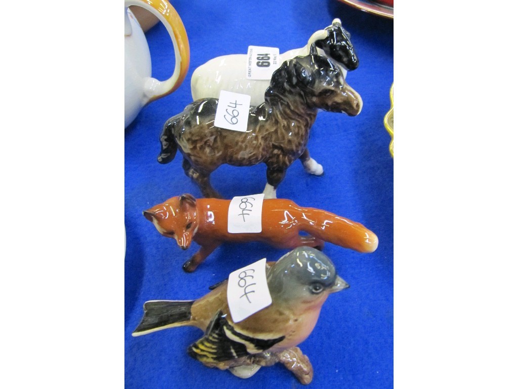 Appraisal: Four Beswick figures to include a ram Shetland foal fox