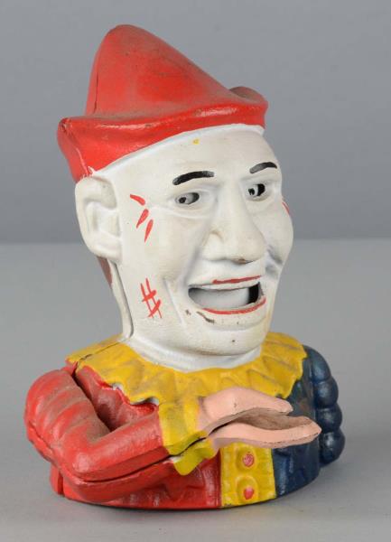 Appraisal: Clown Painted Cast Iron Mechanical Bank Clown's mouth opens and