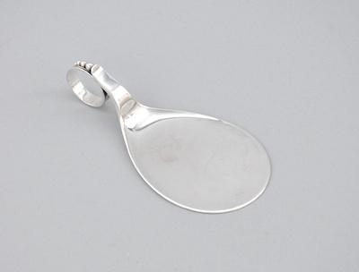 Appraisal: A Sterling Silver Server With a circular handle with thumb