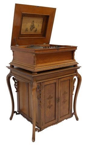 Appraisal: lot of Regina golden oak music box and table cabinet