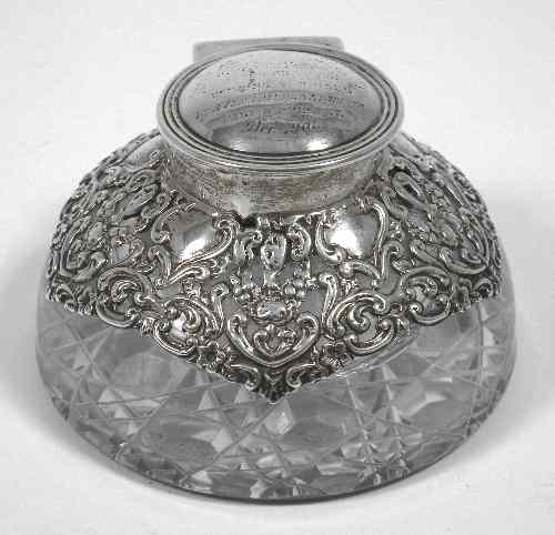 Appraisal: A late Victorian silver mounted glass inkwell of domed shape