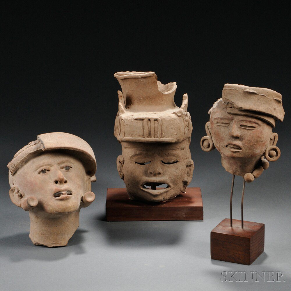 Appraisal: Three Pre-Columbian Pottery Head Fragments Vera Cruz area damage ht