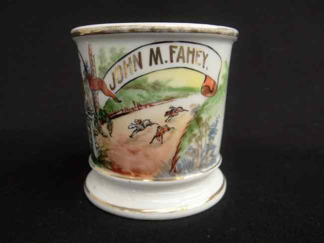 Appraisal: Painted occupational shaving mug with jockey and horses ''John M