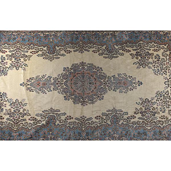 Appraisal: KIRMAN ORIENTAL RUGFloral design in blue and beige with center