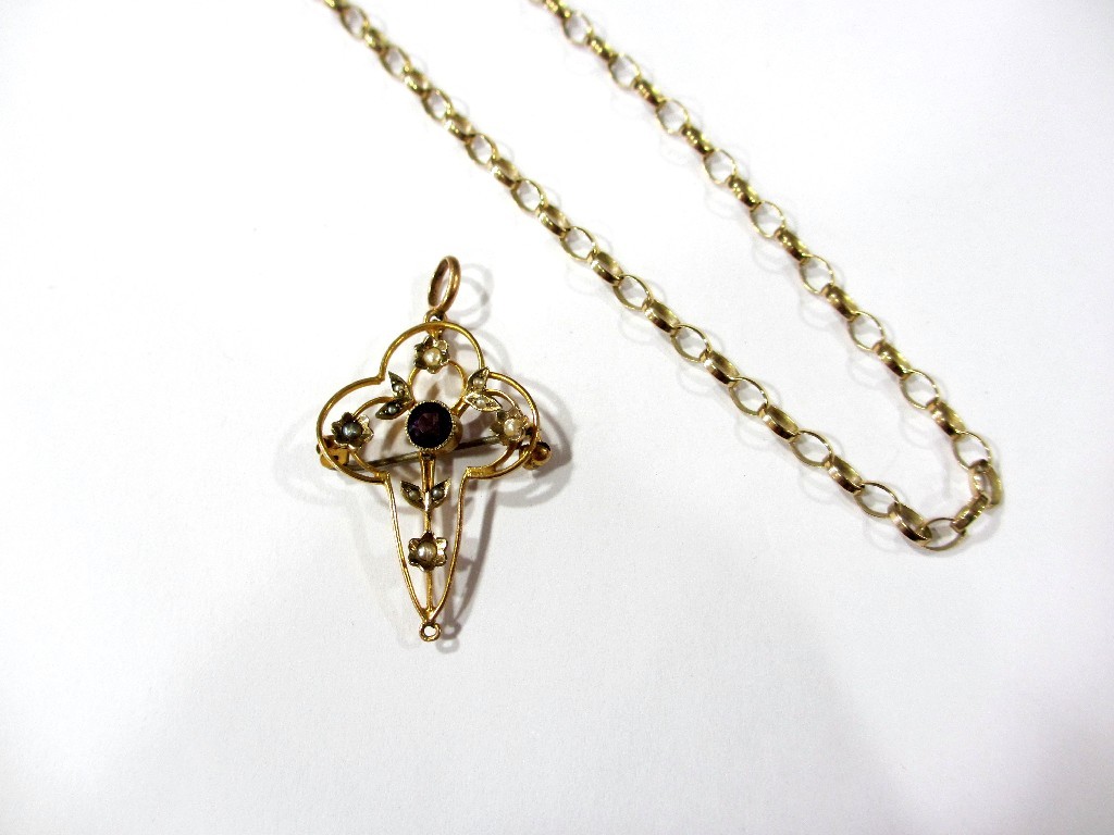 Appraisal: An Edwardian ct gold open scroll pendant set with an