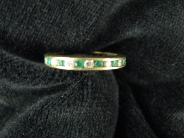 Appraisal: Diamond Emerald Eternity Band carat total k yellow gold with