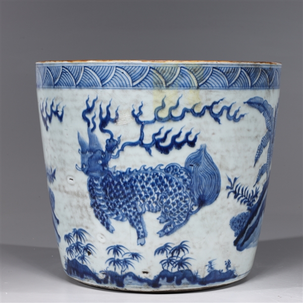 Appraisal: Chinese blue and white porcelain brush pot with qilin and