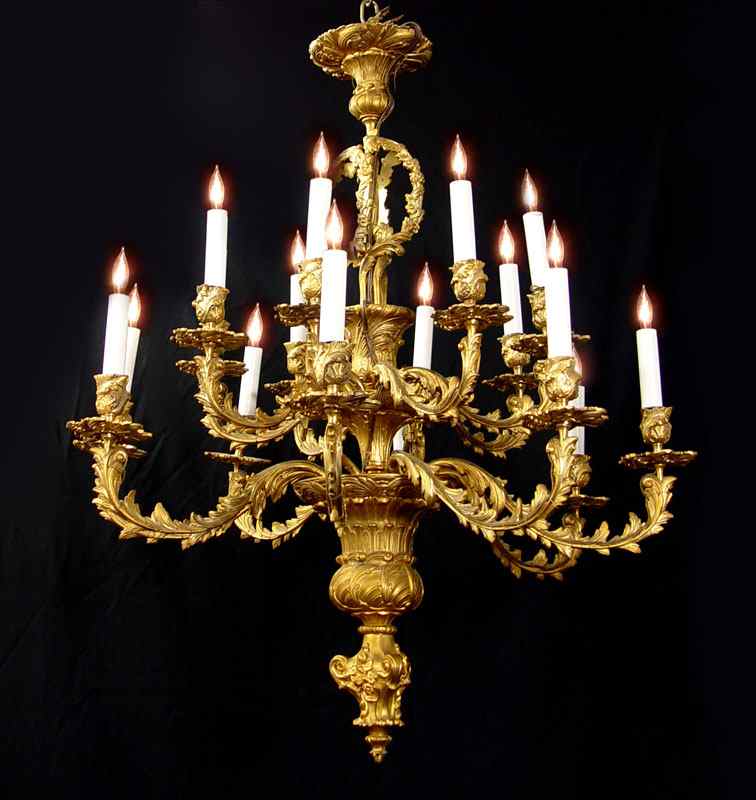 Appraisal: LIGHT FOLIATE MOTIF GILT CHANDELIER Approx ''l excluding the chain