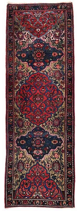 Appraisal: Persian Runner three central cartouche shaped medallions navy borders ft