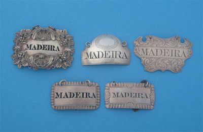 Appraisal: Five various 'MADEIRA' labels a Victorian engraved escutcheon by George