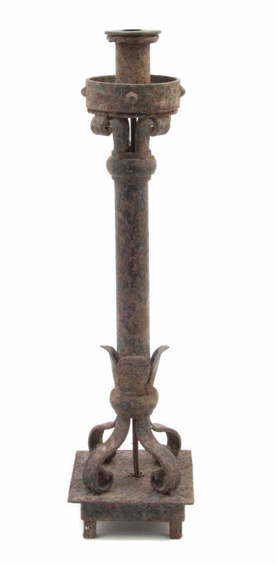 Appraisal: A French Wrought Iron Lamp having a columnar standard with