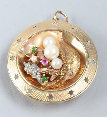 Appraisal: Cultured pearl disk charm Weight grams S