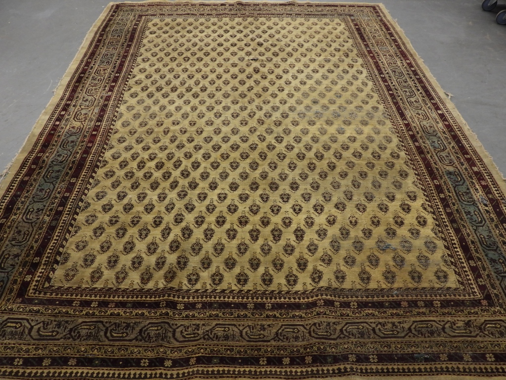 Appraisal: ROOM SIZE AGRA RUG Middle East th CenturyBurgundy blue and