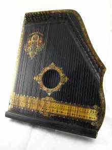 Appraisal: An early th c continental Zither the ebonised case with