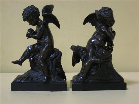 Appraisal: A PAIR OF FRENCH BRONZE FIGURES OF CUPID After Charles