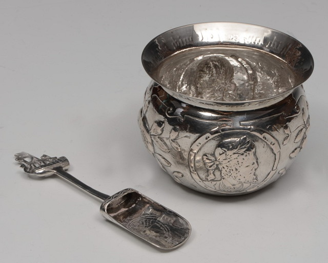 Appraisal: A DUTCH EMBOSSED SILVER SUGAR BOWL with inscription and scoop