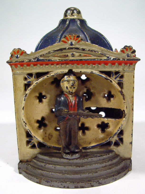 Appraisal: Victorian cast iron money bank in the form of a