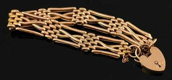 Appraisal: A gold day and night bracelet The gatelink bracelet to