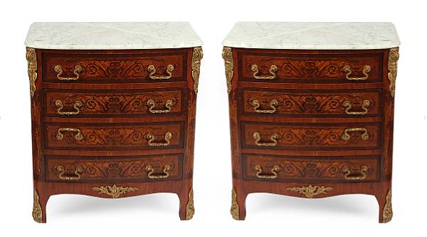 Appraisal: A pair of English style inlaid four drawer commodes with