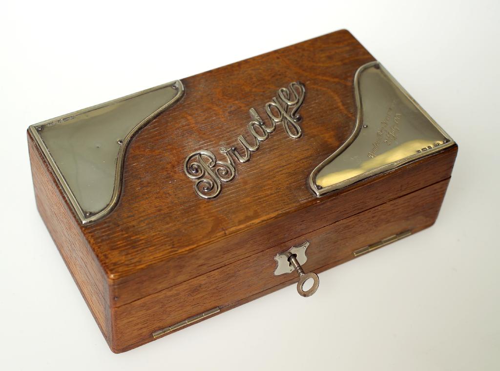 Appraisal: EDWARDIAN SILVER-MOUNTED OAK BRIDGE CARD BOX of rectangular form the