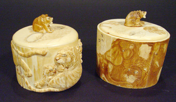 Appraisal: Two circular oriental ivory boxes and covers carved to the