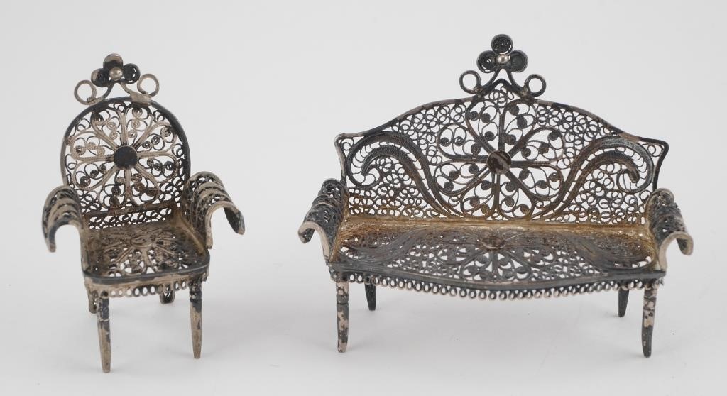 Appraisal: Sterling silver miniature furniture set featuring a settee and arm