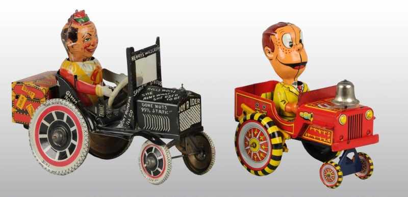 Appraisal: Lot of Tin Whoopee Car Wind-Up Toys Description American Working