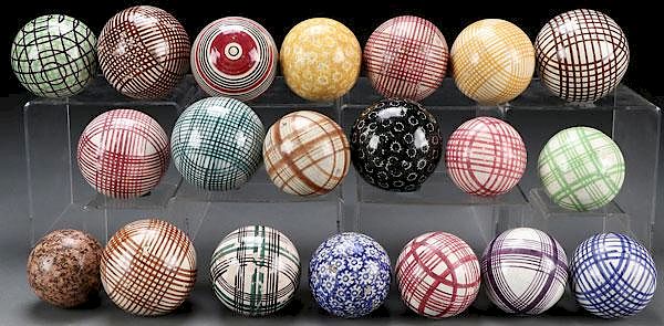 Appraisal: STAFFORDSHIRE POTTERY CARPET BALLS A COLLECTION OF NINETEEN STAFFORDSHIRE POTTERY