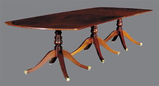 Appraisal: Georgian style mahogany three-pedestal dining table two-piece top with D-shaped