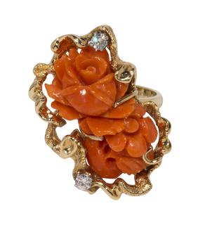 Appraisal: Carved coral diamond and k yellow gold ring Carved coral