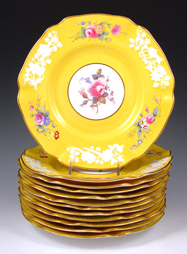 Appraisal: SPODE COPELAND CHINA SALAD PLATES Brightest yellow with embossed white