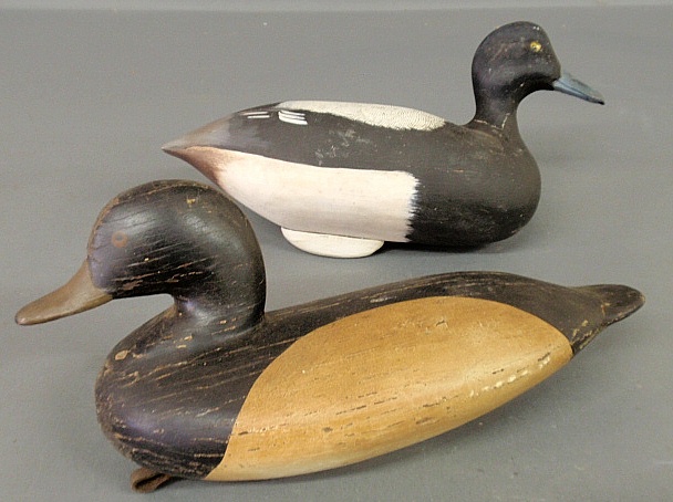 Appraisal: - Two carved duck decoys with original paint decoration one