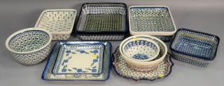 Appraisal: Ten handmade Polish pottery serving dishes including a tall square