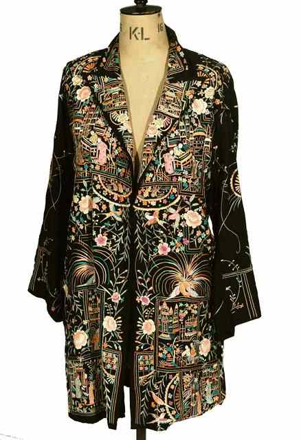 Appraisal: A JAPANESE SILK GOWN with polychrome figure and foliate decoration