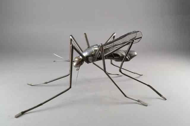 Appraisal: MOSQUITO GARDEN METAL SCULPTUREMosquito garden welded metal sculpture metal stamped