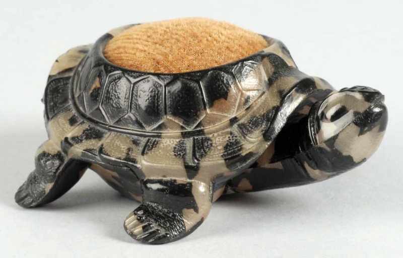 Appraisal: Turtle Figural Tape Measure Pin Cushion Description Made in Japan