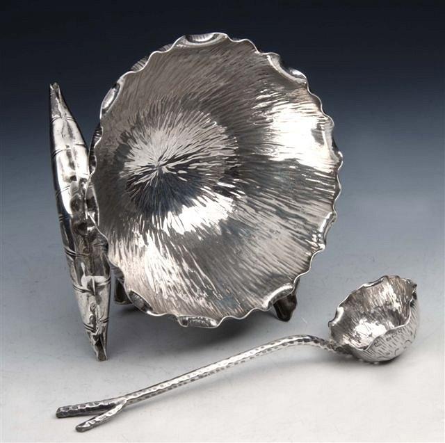 Appraisal: AN EDWARDIAN SILVER SUGAR BASIN and sifter spoon in the