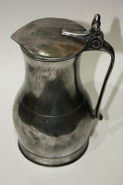 Appraisal: A PEWTER LIDDED TANKARD with acorn finial circa cm high