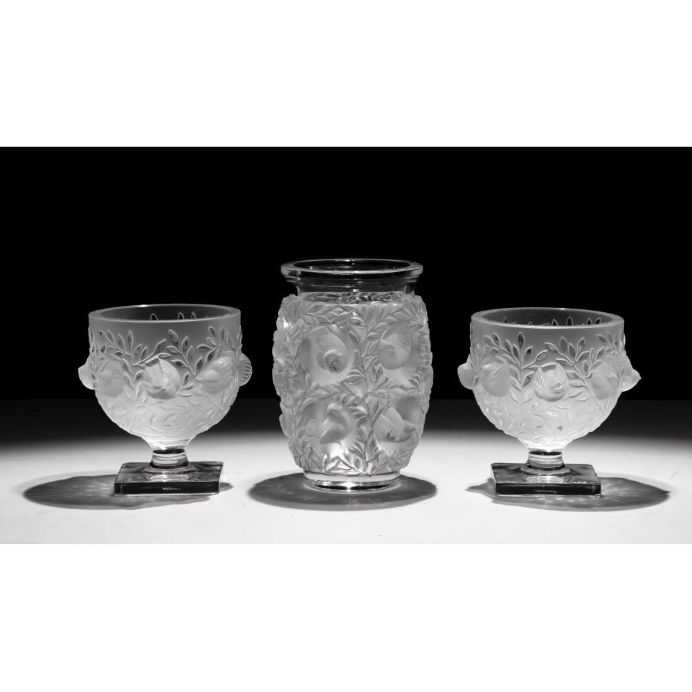 Appraisal: LALIQUE CRYSTAL BIRD VASE ASSORTMENT vases including a Bagatelle and