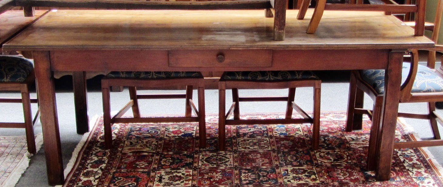 Appraisal: A th century and later French fruitwood farmhouse table the