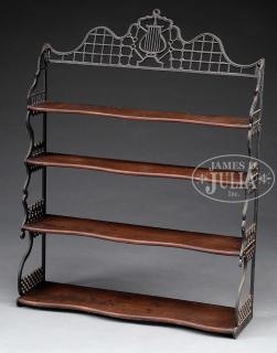 Appraisal: UNUSUAL WALNUT AND CAST IRON FOUR TIER SHELF Second half