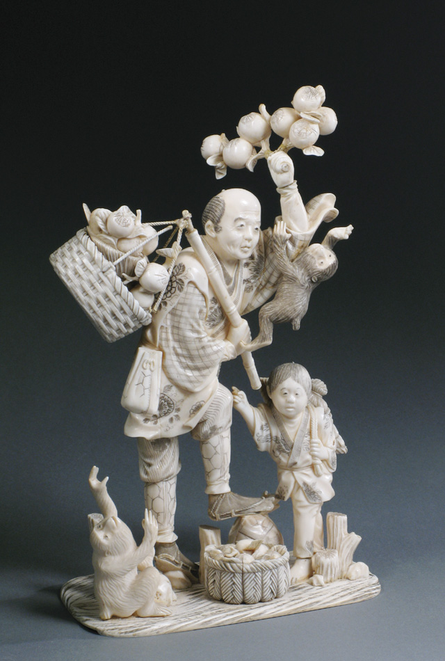 Appraisal: JAPANESE IVORY GROUP CARVING peddler standing on one foot holding