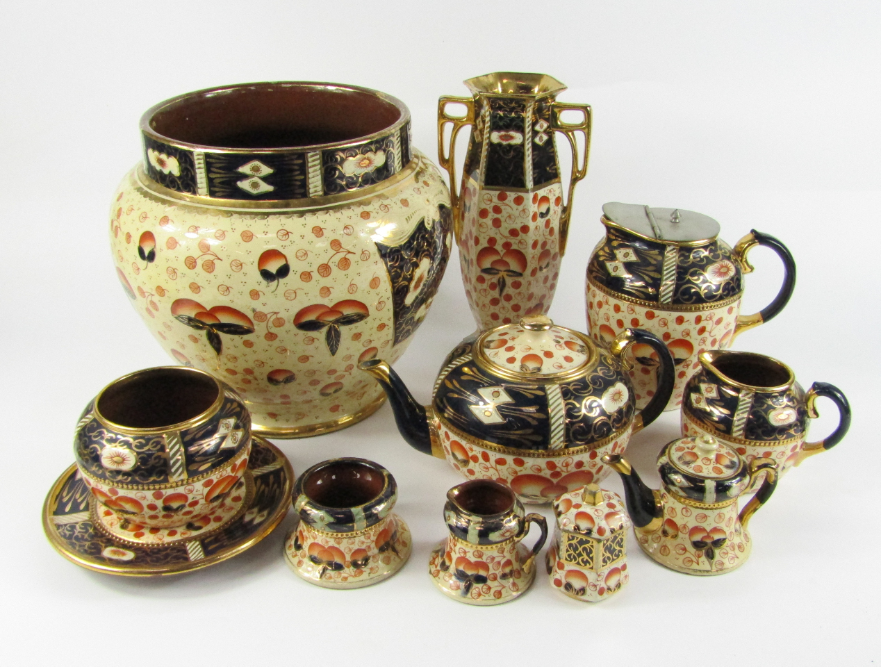 Appraisal: Linguard imari decorated terracotta wares comprising a jardiniere teapot on