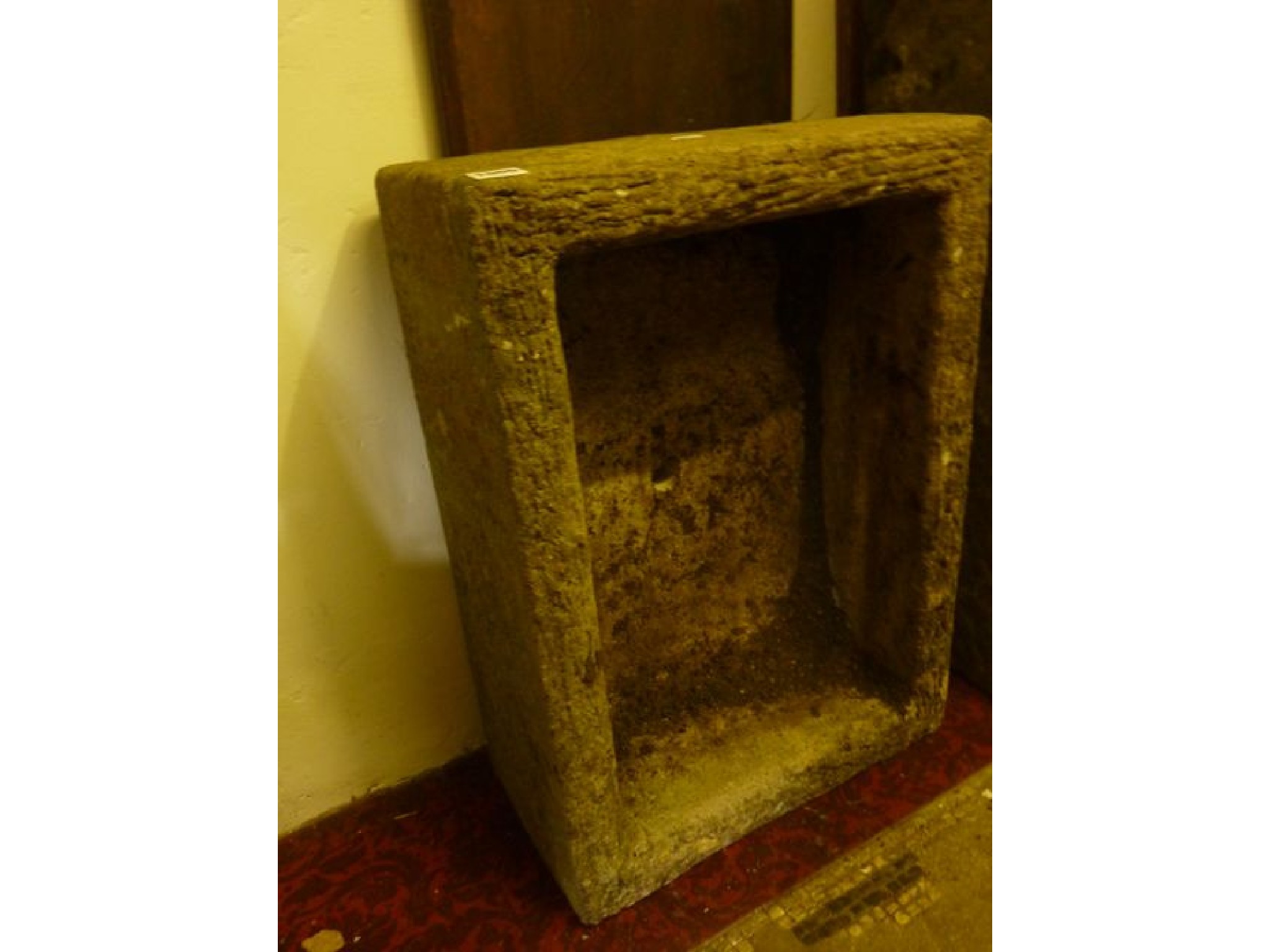 Appraisal: A weathered composition stone trough of rectangular form x cm