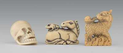 Appraisal: A Group of Three Carved Ivory Netsuke Containing a recumbent