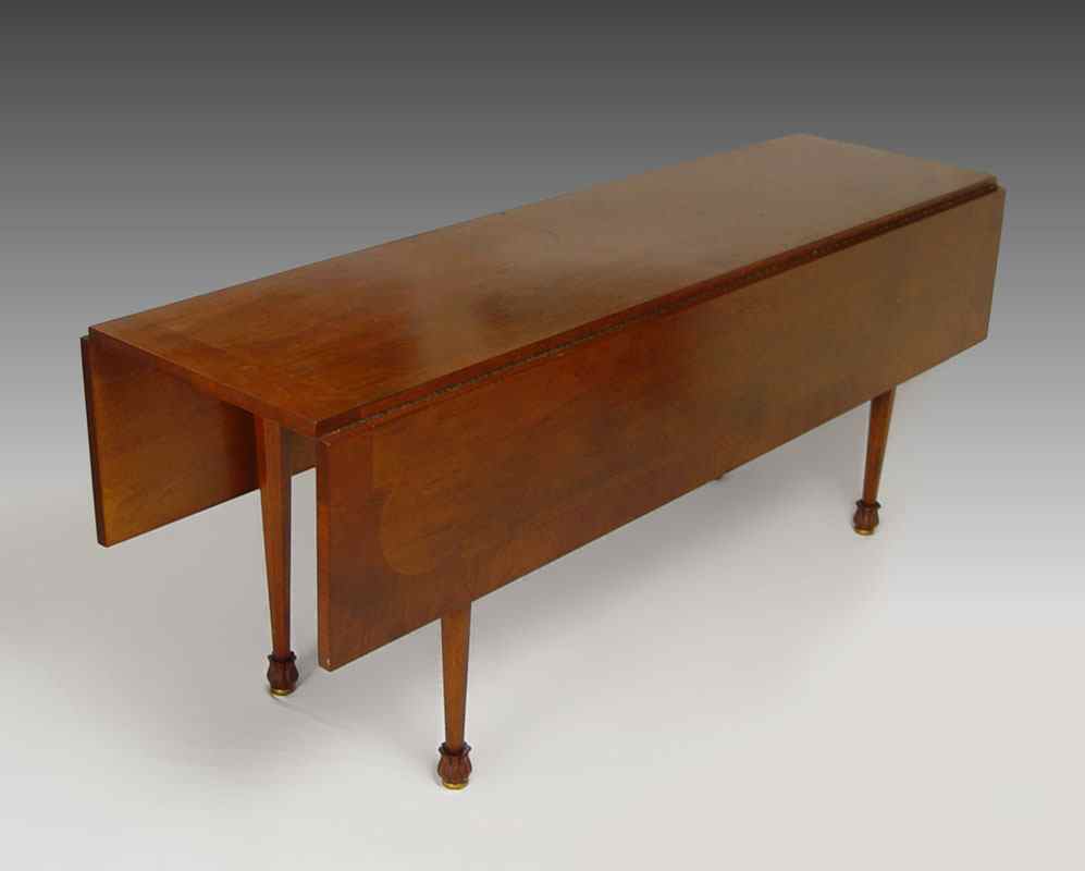 Appraisal: MAHOGANY DROP LEAF HARVEST TABLE Solid mahogany with two tone